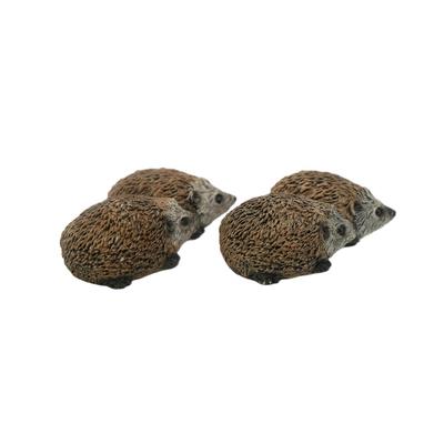Two Baby Hedgehogs Figurines