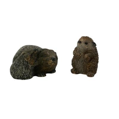 Two Hedgehog Figurines