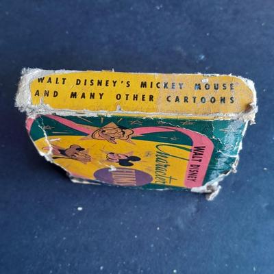 Walt Disney Prod. chalkware Pluto statue and Vintage Walt Disney Character Films reel