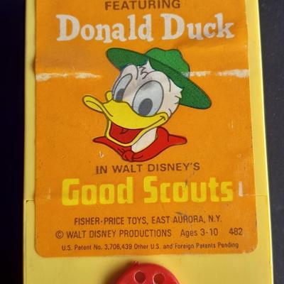 Vintage 1970'S Fisher Price Toys Movie Viewer with Donald duck Movie cartridge hand and held projector.