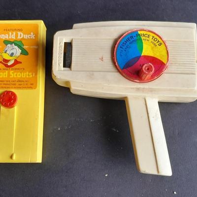 Vintage 1970'S Fisher Price Toys Movie Viewer with Donald duck Movie cartridge hand and held projector.