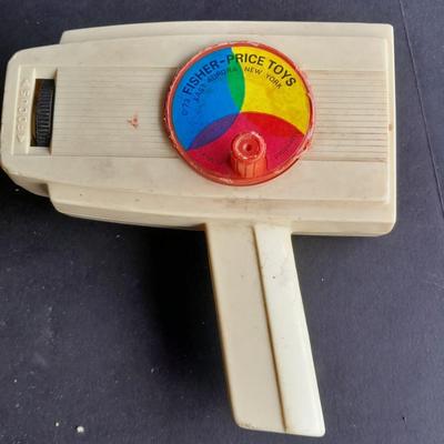 Vintage 1970'S Fisher Price Toys Movie Viewer with Donald duck Movie cartridge hand and held projector.