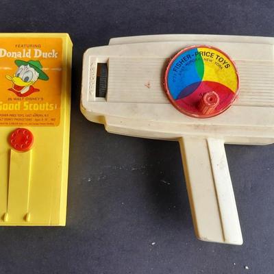 Vintage 1970'S Fisher Price Toys Movie Viewer with Donald duck Movie cartridge hand and held projector.