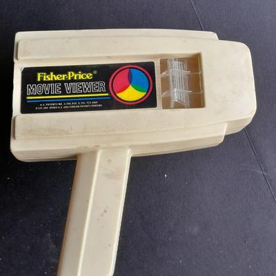 Vintage 1970'S Fisher Price Toys Movie Viewer with Donald duck Movie cartridge hand and held projector.