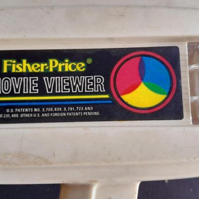 Vintage 1970'S Fisher Price Toys Movie Viewer with Donald duck Movie cartridge hand and held projector.