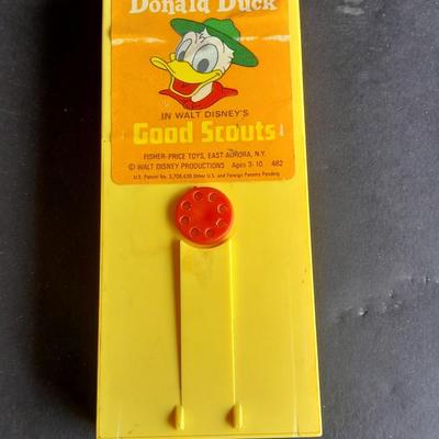 Vintage 1970'S Fisher Price Toys Movie Viewer with Donald duck Movie cartridge hand and held projector.