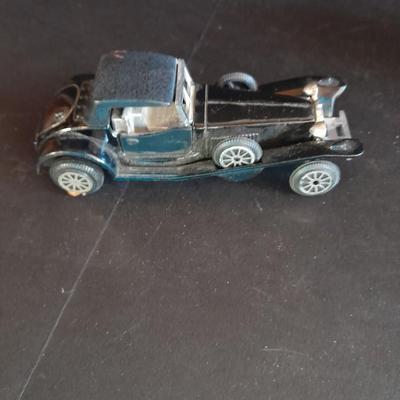 Motorcycle toy, radio flyer wagon, and black Riley MPH