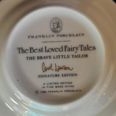 The Brave Little Taylor plate with story, and an Avon 10th Anniversary Plate in Box with paperwork