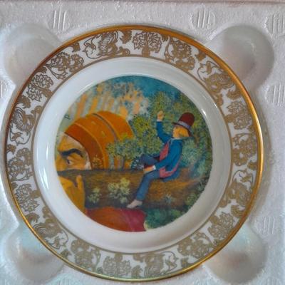 The Brave Little Taylor plate with story, and an Avon 10th Anniversary Plate in Box with paperwork