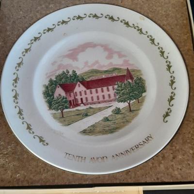 The Brave Little Taylor plate with story, and an Avon 10th Anniversary Plate in Box with paperwork