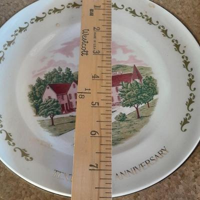 The Brave Little Taylor plate with story, and an Avon 10th Anniversary Plate in Box with paperwork