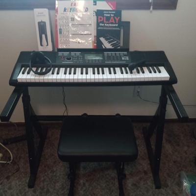 ELECTRIC KEYBOARD, STAND, STOOL, SHEET MUSIC AND MORE