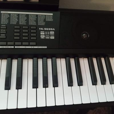 ELECTRIC KEYBOARD, STAND, STOOL, SHEET MUSIC AND MORE