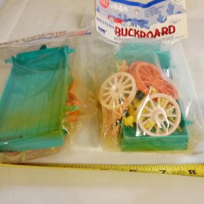 LOT 40   TWO BAGS TOY HOUSE BUCKBOARDS