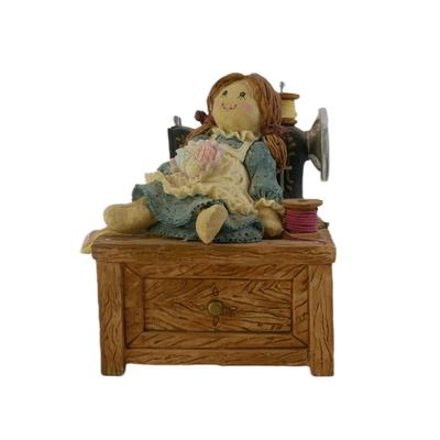Vintage Doll and Sewing Machine Musical Figurine