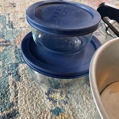 Lot of kitchen items: pyrex, rolling pin, and more
