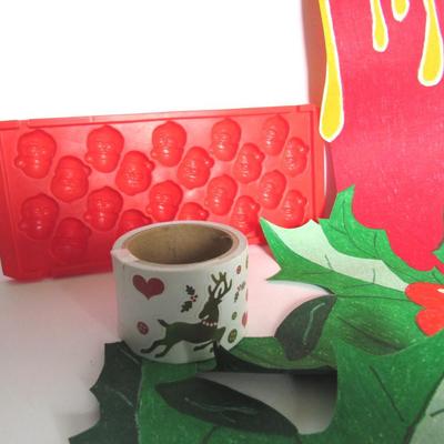 Misc Lot of Christmas Decor, Santa Head Ice Cube Tray, Book, and Roll of Christmas Stickers