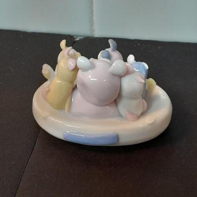 Pig salt and pepper shakers, porcelain pig figure, and Enesco Three sleeping pigs