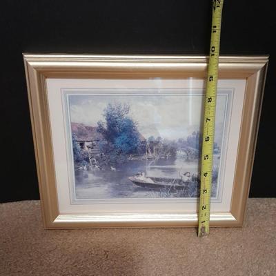 Two gold framed pictures
