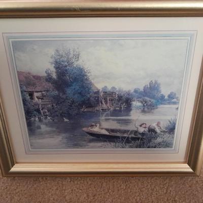 Two gold framed pictures