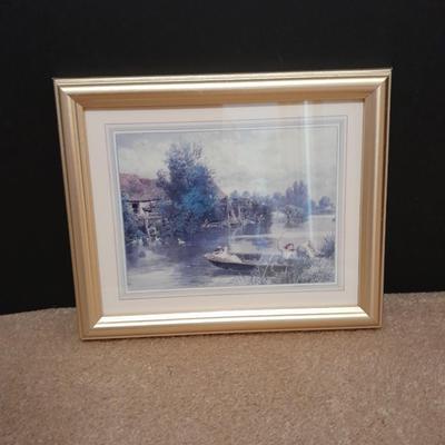 Two gold framed pictures