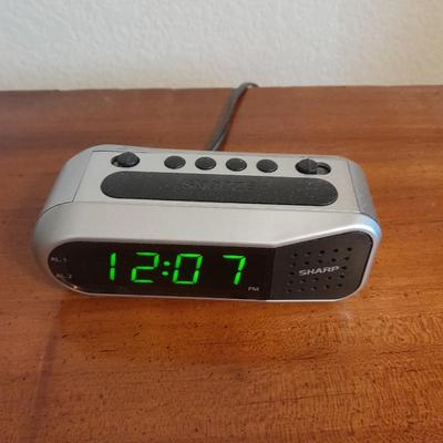 Two drawer Twin Oaks Furniture nightstand with Sharp alarm clock 1 of 2