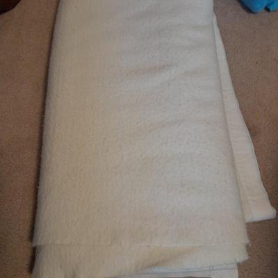 Three Polyester blankets with silk edging