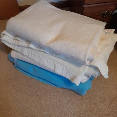 Three Polyester blankets with silk edging