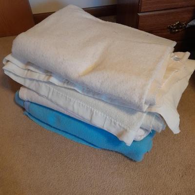 Three Polyester blankets with silk edging