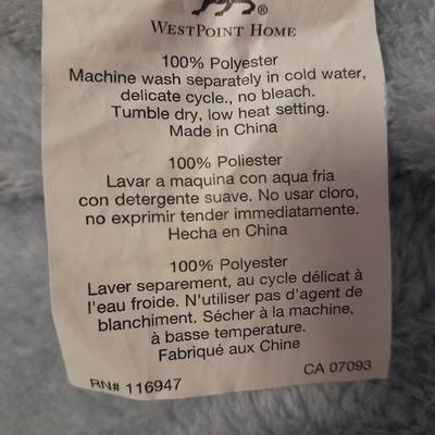 WestPoint Home Polyester Sofy King sized blue blanket and soft purple throw blanket