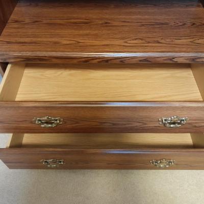 Tall wardrobe / storage cabinet with shelves inside doors and two drawers