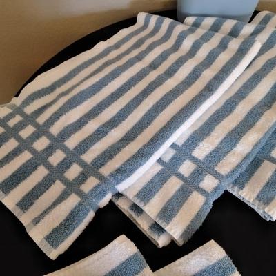 Cannon Blue and white striped towels with a blue waste can