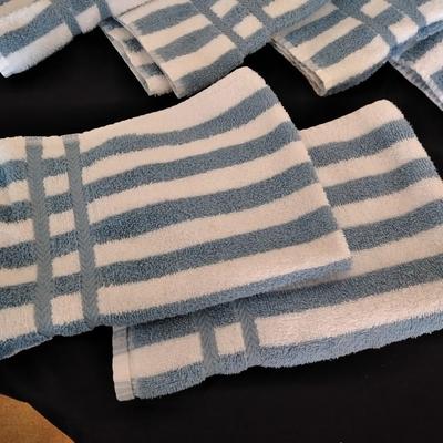 Cannon Blue and white striped towels with a blue waste can