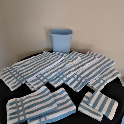 Cannon Blue and white striped towels with a blue waste can