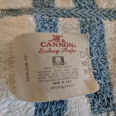 Cannon Blue and white striped towels with a blue waste can