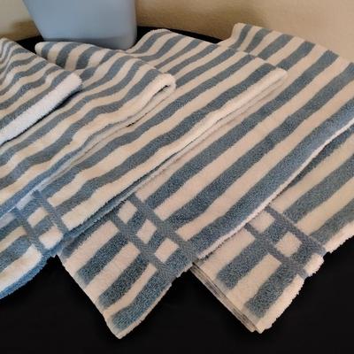 Cannon Blue and white striped towels with a blue waste can