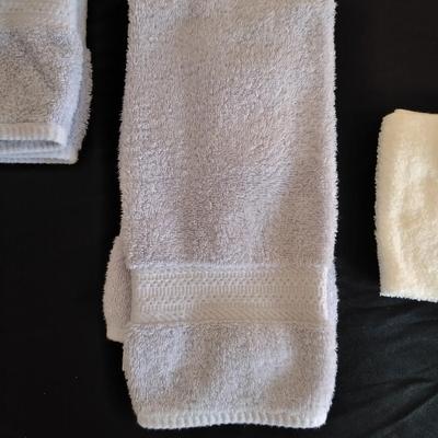 Bath rug with bath towels, hand towels and washcloths
