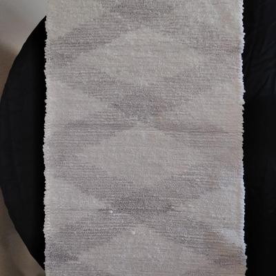 Bath rug with bath towels, hand towels and washcloths