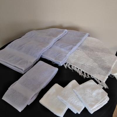 Bath rug with bath towels, hand towels and washcloths