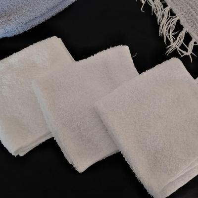 Bath rug with bath towels, hand towels and washcloths