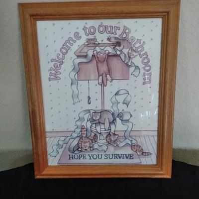 Bath rug, towels and framed bath themed wall art