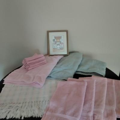 Framed bathroom wall art, Two rugs, Bath towels, washcloth and hand towels