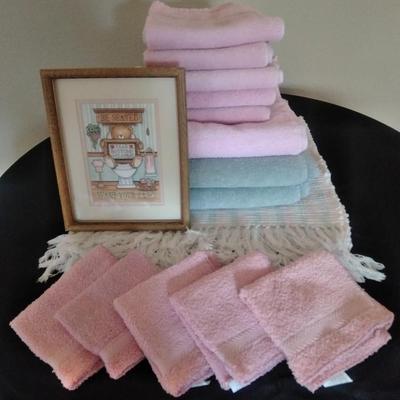 Framed bathroom wall art, Two rugs, Bath towels, washcloth and hand towels