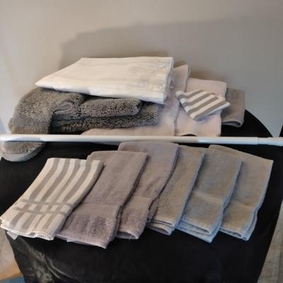 Three-piece Grey Bath rug set, Shower curtain with rod, and Bathroom Towel set