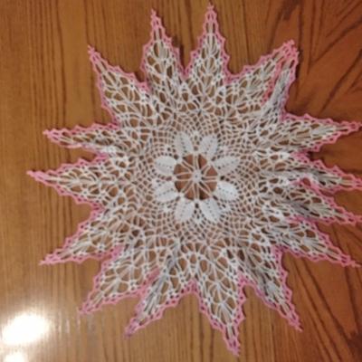 Doilies, round red with lace tablecloth and lace table runner