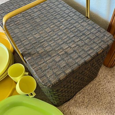 Vintage picnic basket with plasticware