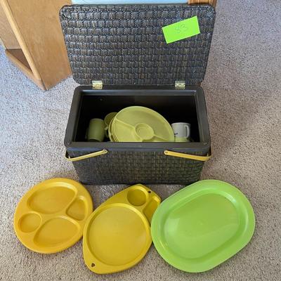 Vintage picnic basket with plasticware