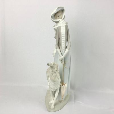 Lot 548 Signed LLADRO Porcelain Figure, Lady Walking a Greyhound