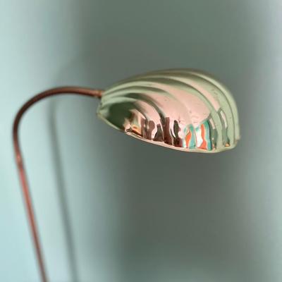 Books, reading lamp and hanging light.