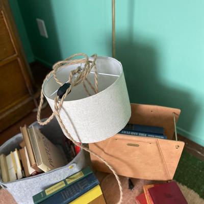Books, reading lamp and hanging light.